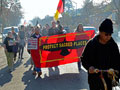 Demonstrators Protest the Desecration of Rattlesnake Island at the Home of John Nady