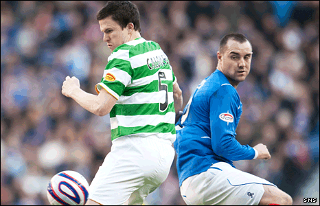 Celtic's Gary Caldwell and Rangers' Kris Boyd