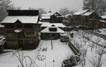 A view of cluster houses with heavy snowfall on rooftops in Bandipora District 50 Kms from Srinagar on 06, January 2012.