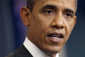 President Barack Obama answers questions on the ongoing budget negotiations during a press conference in the Brady Briefing Room of the White House in Washington, Friday, July 15, 2011.