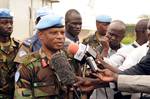 File - Moses Obi (front), Interim Force Commander of the newly-formed United Nations Mission in the Republic of South Sudan (UNMISS), speaks with the press after his tour of Pibor to assess the security situation, mainly pertaining to child abduction and cattle raiding, 9 August, 2011.