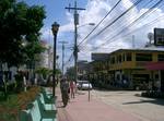 Tela main street and park. Tela is a town in Honduras on the northern Caribbean coast.