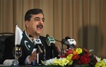 Pakistan's Prime Minister Yousuf Raza Gilani speaks during a press conference in Islamabad, Pakistan Sunday, Feb. 1, 2009. Pakistan's prime minister said that military action "is not the only solution" to the brutal insurgency in the Swat Valley, an indication that negotiations may still be an option despite a failed past peace deal in the one-time tourist haven.