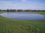 A flood lake caused by bunding. There are about 500 acres (2.0 km2) of parkland and 8 acres (32,000 m2) of more formal gardens.