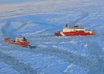 BERING SEA - The Coast Guard Cutter Healy approaches the Russian-flagged tanker Renda while breaking ice around the vessel 97 miles south of Nome, Alaska, Jan. 10, 2012. The two vessels departed Dutch Harbor for Nome on Jan. 3, 2012, to deliver more than 1.3 million gallons of petroleum products to the city of Nome. U.S. Coast Guard photo by Petty Officer 1st Class Sara Francis. (1494320) ( Healy escorts Renda )