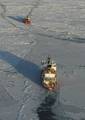 BERING SEA - The Coast Guard Cutter Healy approaches the Russian-flagged tanker vessel Renda while breaking ice around the vessel 250 miles south of Nome, Alaska, Jan. 6, 2012. The two vessels departed Dutch Harbor for Nome on Jan. 3, 2012. U.S. Coast Guard photo by Petty Officer 1st Class Sara Francis. (1489492) ( Healy escorts Renda )