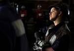 Seaman Sara Schmid, assigned to the deck department aboard the Nimitz-class aircraft carrier USS Carl Vinson (CVN 70), operates a sliding padeye during a replenishment at sea.