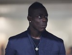 Inter Milan forward Mario Balotelli looks on at a Serie A soccer match between Inter Milan and Siena, at the San Siro stadium in Milan, Italy, Saturday, Jan.9, 2010