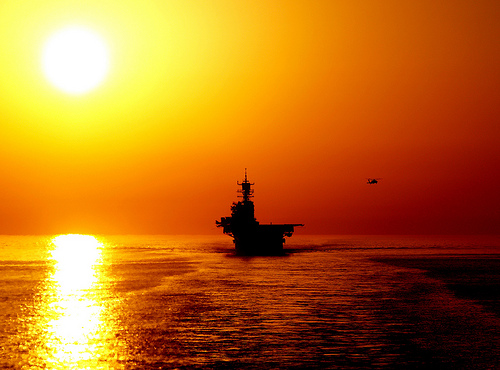 The amphibious assault ship USS Bataan (LHD 5) transits the Strait of Hormuz. / Credit:U.S. Navy