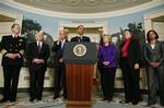 President Barack Obama makes a statement about the earthquake in Haiti, Thursday, Jan. 14,2010, at the White House in Washington. From left are: Joint Chiefs Chairman Adm. Mike Mullen, Defense Secretary Robert Gates, Vice President Joe Biden, Secretary of State Hillary Rodham Clinton, Homeland Security Secretary Janet Napolitano, and U.N. Ambassador Susan Rice.