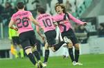 Juventus captain Alessandro Del Piero celebrates after scoring with teammate Andrea Pirlo, right, during the Italian Cup eight final soccer match between Juventus and AS Roma, in Turin, Italy, Tuesday, Jan. 24, 2012.