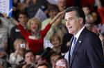 Republican presidential candidate, former Massachusetts Gov. Mitt Romney, celebrates his Florida primary election win at the Tampa Convention Center in Tampa, Fla., Tuesday, Jan. 31, 2012.