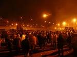 From left to right: Camels in Tahrir Square; and Battle of Tahrir Square during the evening of February 2, 2011. During the night of 1–2 February, Mubarak supporters and protesters clashed in Alexandria, where shots were reportedly fired into the air.