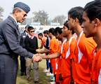 The Vice Chief of Air Staff, Air Marshal KK Nohwar being introduced with the teams and officials during the Final Match of the 52nd Subroto Cup Football Tournament - 2011 also seen Mr. Baichung Bhutia, the former captain of Indian Football team at Dr. Ambedkar Stadium, New Delhi on November 25,2011.