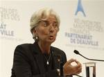 International Monetary Fund (IMF) managing director Christine Lagarde delivers her speech at the end of the Deauville partnership meeting in Marseille, southern France, Saturday, Sept.10, 2011.