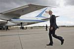 President Barack Obama walks to board Air Force One in Paris, France, France, Friday, May 27, 2011, as he travels to Warsaw, Poland, leaving the G8 summit in Deauville, France.