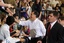 Republican presidential candidate, former Massachusetts Gov. Mitt Romney greets supporters at a campaign rally at Arapahoe High School in Centennial, Colo., Monday, Feb. 6, 2012.