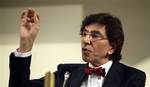 Belgium's chief government negotiator Elio Di Rupo speaks during a media conference at the Belgian Federal Parliament in Brussels on Sunday, Nov. 27, 2011.