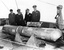 Eighty days after it fell into the ocean following the January 1966 midair collision between a nuclear-armed B-52G bomber and a KC-135 refueling tanker over Palomares, Spain, this B28RI nuclear bomb was recovered from 2,850 feet (869 meters) of water and lifted aboard the USS Petrel (note the missing tail fins and badly dented "false nose").