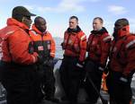 NEW YORK - The Today Show's Al Roker, (far left), interviews Coast Guard Station New York's first responders who rescued passengers from US Airways Flight 1549, which ditched on the Hudson River a year ago, for an anniversary news segment Jan. 11, 2010. The segment is being taped for The Weather Channel's 