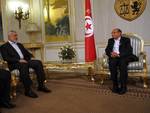 Tunisian President Moncef Marzouki (R) greets Gaza's Hamas prime minister Ismail Haniya (L) as they pose on January 5, 2012 in Carthage Palace inTunis. Haniya is on two-day official visit to Tunisia.Photo by Ahmed Deeb/ WN