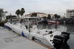 LOS ANGELES - Two vessels used by suspected drug smugglers sit at the docks of Coast Guard Sector Los Angeles-Long Beach, Jan. 11, 2012. The Coast Guard apprehended eight people and recovered nearly 2,000 pounds of marijuana during two separate interdictions northwest of Catalina Island, Calif. While on patrol, the Coast Guard Cutter Halibut and a 45-foot Response Boat Medium from Coast Guard Station Los Angeles-Long Beach located two contacts on radar. As the Coast Guard vessels approached the