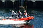 Seattle - July 22, 2003 - MSNBC's Bob Arnot, and cameraman, ride with USCG Station Seattle while filming a segment on port safety and security. (USCG phot by Petty Officer Robert K. Lanier) (91569) ( USCG WITH MSNBC_11 )