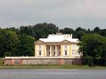 Tyszkiewicz palace on Lake Galvė. After the Grand Duchy of Lithuania joined the Kingdom of Poland into Polish–Lithuanian Commonwealth in 1569, the castles remained a royal property, but the town's importance gradually declined, with the nearby Vilnius and the political center of the Commonwealth in Kraków being far more important.