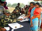 INDIA-CRPF-DISTRABUTING-FOODCRPF jawan seen distributing food to the villagers of Chandabila in Jhargram in a CRPF 148 Bn public relation camp on Monday.// CRPF jawans seen distributing medicine to the patients in the health check up camp at Chandabila in Jhargram in Eastern India ------ WN/BHASKAR MALLICK