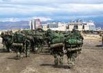 U.S. Marines assigned to Golf Battery, the artillery unit of Battalion Landing Team, 1st Bn., 6th Marines, make there way back to a Landing Craft Air Cushion (LCAC).