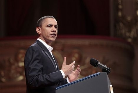 U.S. President Barack Obama speaks at the Theatro Municipal in Rio de Janeiro, Brazil, Sunday, March 20, 2011. Obama praised Brazil's transition from dictatorship to democracy as a model for the Arab world, where decades of stability enforced by strongmen is giving way to an uncertain but potentially brighter future.