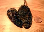 Chipotle peppers (morita variety).Smoke-dried fruit of Capsicum annuum cv. 'Jalapeño' (called 'Chipotle')