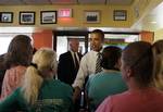 President Barack Obama visits Ross' Restaurant, Tuesday, June 28, 2011, in Bettendorf, Iowa. Obama on Tuesday brought a made-in-America pitch to this politically vital state, saying innovation and adaptation will help the manufacturing sector and the entire U.S. economy rebound with more gusto. He admonished a divided Washington to stop bickering and rally together like a team.