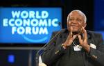 Desmond M. Tutu, Archbishop Emeritus of South Africa gestures during the session 'Believing in the Dignity of All' at the Annual Meeting 2009 of the World Economic Forum in Davos,