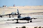 Front view of two Egyptian Air Force Tu-16, Tupolev, aircraft taxing on the runway during airlift exercise Bright Star. The Tu-16's NATO designation is Badger.