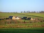 A view of Gill Mill farm in 2007. Close to Kirkmuir (previously Laigh Kirkmuir), a farm occupied by William Mure in 1692,[7] is the Freezeland plantation on the turnpike as marked on the 1858 OS. Nowadays it is a smallholding without a dwelling house.