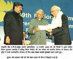 The President Dr. A. P.J Abdul Kalam presenting the Dada Saheb Phalke Award for the year 2001 to noted film-maker Shri Yash Chopra, for outstanding contribution to the growth and development of Indian cinema at the 49th National Film Awards function in N