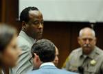 Dr. Conrad Murray prepares to leave for lunch recess after the prosecution had delivered its closing arguments during Murray's involuntary manslaughter trial in the death of singer Michael Jackson at the Los Angeles Superior Court on Thursday, Nov. 3, 2011 in Los Angeles.