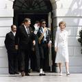 President Ronald Reagan and first lady Nancy Reagan welcome pop singer Michael Jackson to the White House in the 1980s. Whereas Jackson was famous as an entertainer, the Reagans gained fame through their involvement in American politics.