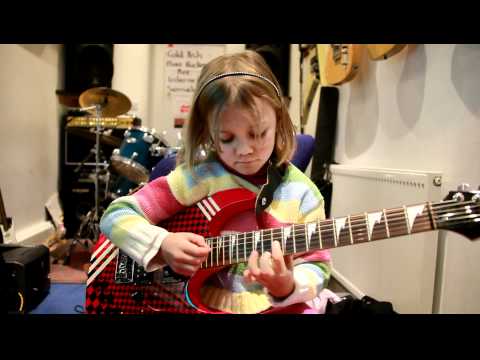 7 year old Mini Band guitarist Zoe plays Sweet Child O Mine by Gun' 'N Roses