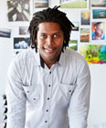 Young man in creative office (© Alistair Berg/Getty Images)