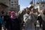 Villagers carry the body of Ghassan Ali, 40, who was killed during clashes between the Free Syrian Army and the government forces during his funeral in Sarmin, north of Syria, Tuesday, Feb. 28, 2012.