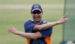 Australian cricket captain Michael Clarke stretches during a practice session ahead of their third and final test cricket match against Sri Lanka in Colombo, Sri Lanka, Wednesday, Sept. 14, 2011.