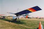 Quicksilver MX Sprint, The C model was the earliest powered version and consisted of the Quicksilver hang glider, including the weight shift sling seat, with a McCulloch MAC 101 power plant of 12 hp (9 kW), a V-belt reduction drive and a 1.7 USgal (6 l) fuel tank.