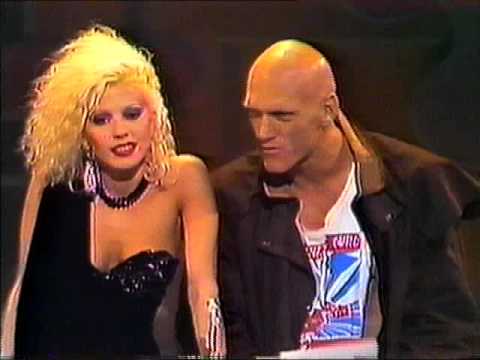 Dale Bozzio and Peter Garrett presenting an award