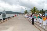 India School children welcoming foreign naval ships at the Wharf of Andaman and Nicobar Command (ANC) at Port Blair on Tuesday, ahead of Milan?2012 in Eastern India