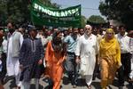 Members of mainstream political party Awami National conference led by party president khaldi shah and Vice president Muzaffar shah in a protest rally in Srinagar on 15, July 2010. ANC took out this march today to protest the recent civilan killings by Indian police in Kashmir.