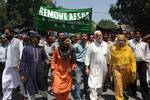 Members of mainstream political party Awami National conference led by party president khaldi shah and Vice president Muzaffar shah in a protest rally in Srinagar on 15, July 2010. ANC took out this march today to protest the recent civilan killings by Indian police in Kashmir.