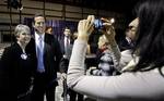 Republican presidential candidate, former Pennsylvania Sen. Rick Santorum, center, poses for a photo during a rally, Saturday, March 10, 2012, in Cape Giradeau, Mo. Santorum won the Kansas caucuses in a rout on Saturday and Republican presidential front-runner Mitt Romney countered in Wyoming, a weekend prelude to suddenly pivotal Southern primary showdowns in the week ahead. (AP Photo/Eric Gay)