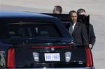 President Barack Obama enters his limousine after landing at the Orlando International Airport in Orlando, Fla., Thursday, Jan. 19, 2012.